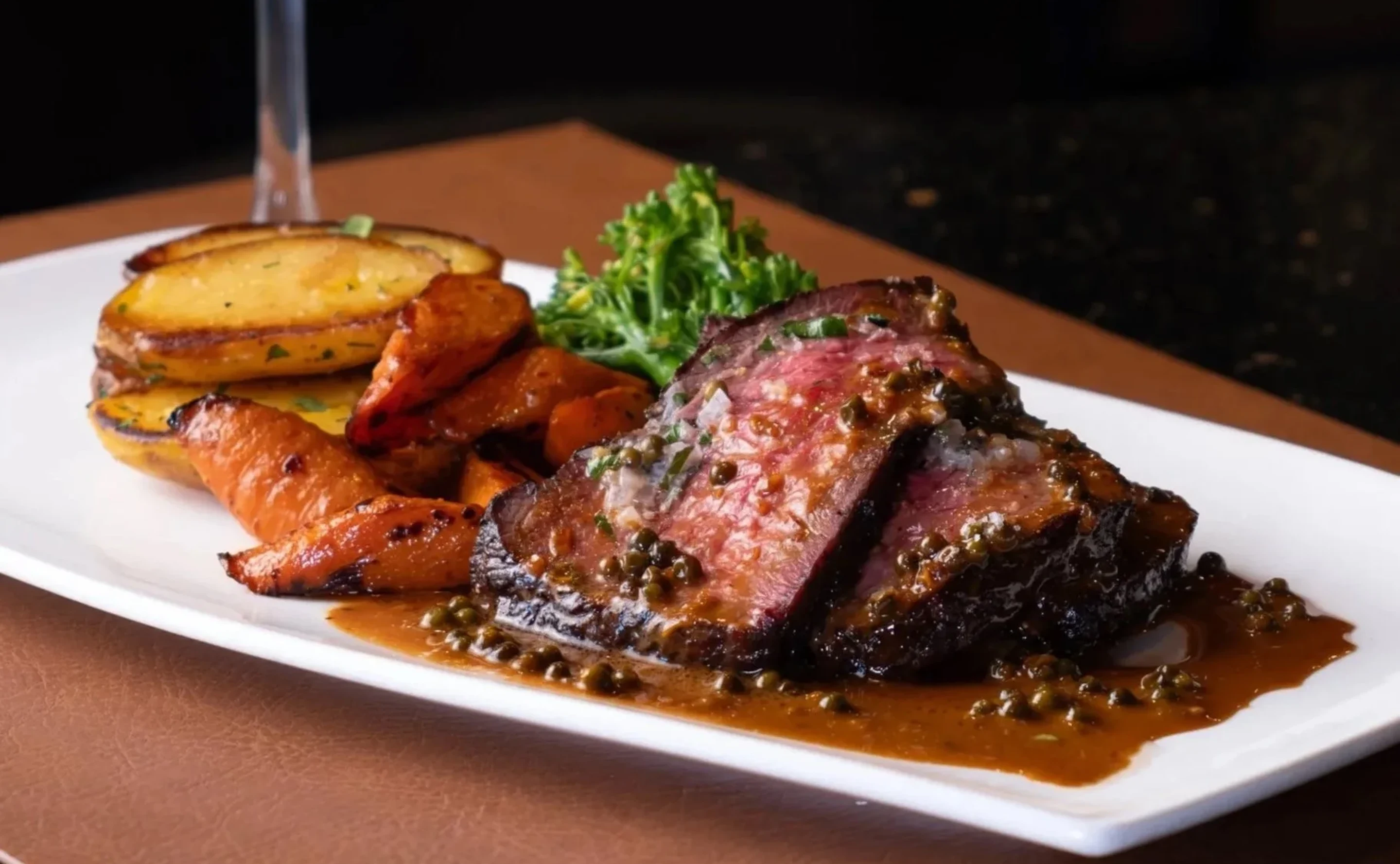 Steakhouse dishes ready for delivery from notable - The Steakhouse in northwest Calgary